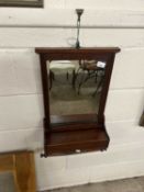 Small late 19th Century mahogany framed wall mirror with integral storage section and towel rail