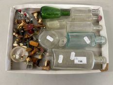 Mixed Lot: Various vintage chemists bottles, miniature wooden figures etc