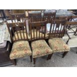 Set of six late Victorian oak framed dining chairs with carved decoration and floral upholstered