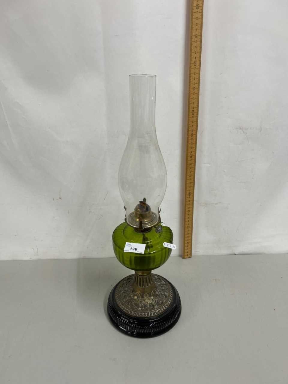 Late 19th or early 20th Century oil lamp with green glass font