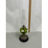 Late 19th or early 20th Century oil lamp with green glass font