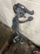 Sheet metal figure of a boy, originally from the snails ride, Great Yarmouth