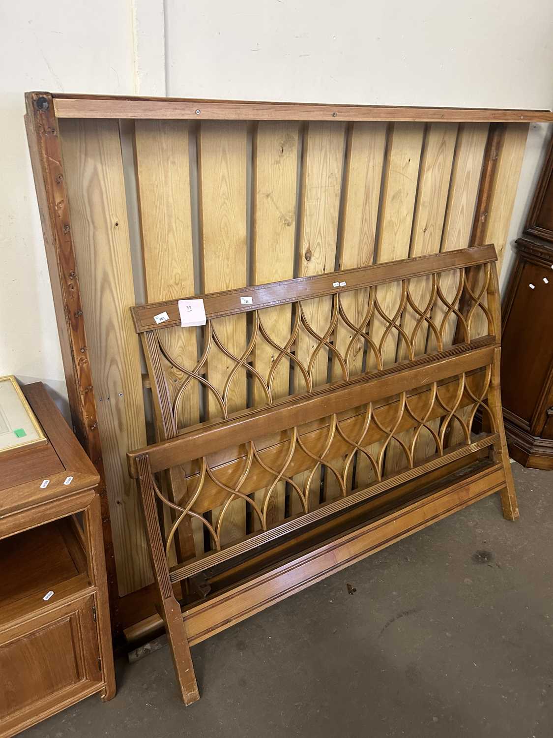 King size bed frame with lattice detailed ends and slatted centre