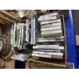 Box of various Xbox and Nintento Wii and other computer games
