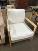 Light wood framed armchair