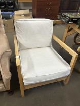 Light wood framed armchair