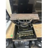 Vintage Corona portable typewriter in leather case