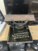 Vintage Corona portable typewriter in leather case