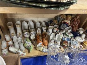 Collection of various porcelain shoes and other ornaments