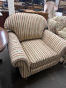 Striped upholstered armchair