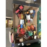 Box of various assorted toy tractors and farm implements, play worn condition throughout