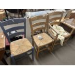 Three rush seated kitchen chairs