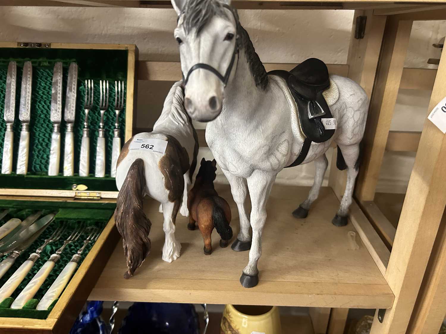 Three various model horses