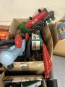 Box of various toy trains and other items