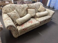 Floral upholstered three seater sofa