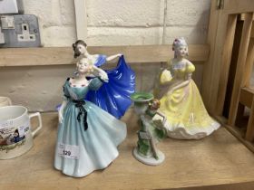 Group of four Royal Doulton and other figurines