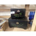 Two black lacquered jewellery boxes