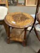 Small oak table with circular carved top
