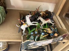 Box of various plastic toy soldiers and others