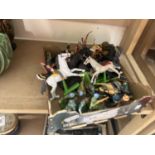 Box of various plastic toy soldiers and others