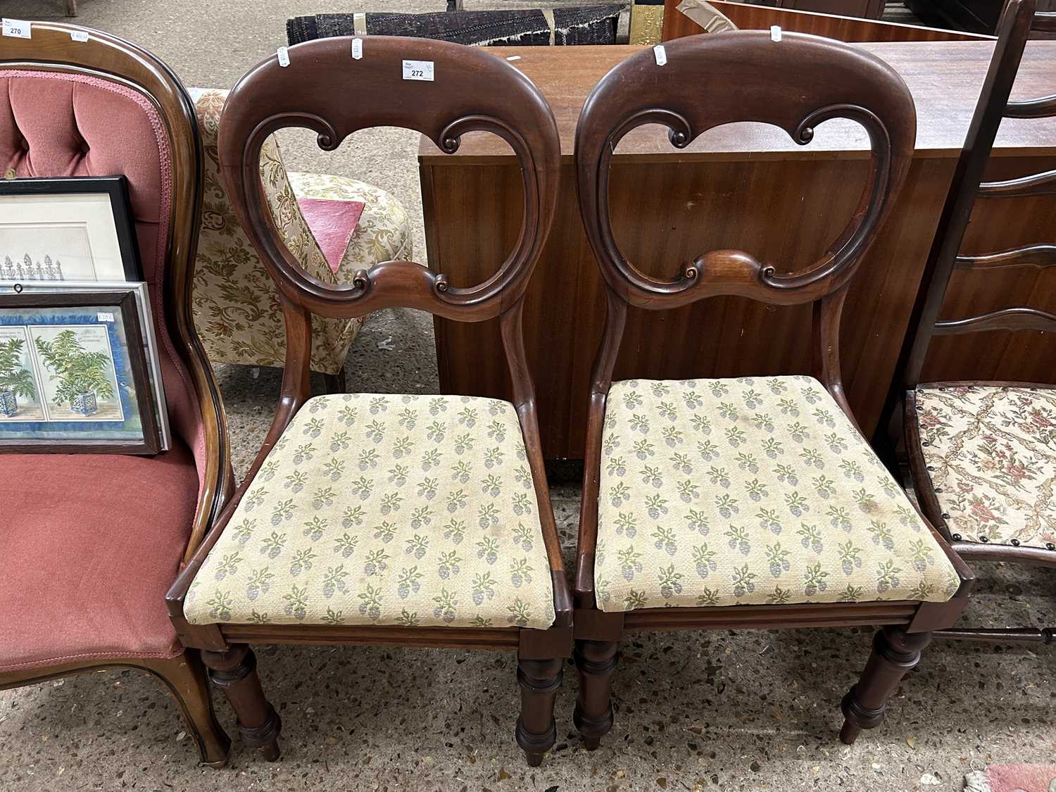 A pair of Victorian mahogany balloon back dining chairs