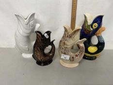 Four Dartmouth and other gurgle fish jugs