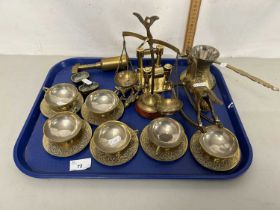 Tray of various assorted brass wares to include cups and saucers, beam scales, model rocking horse