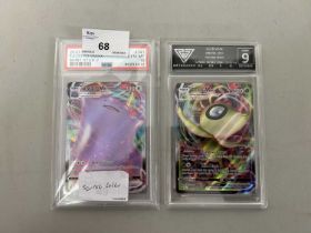 Two graded cased Pokemon cards
