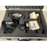 Minolta 404Si camera with lenses and accessories in a fitted travel case
