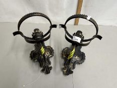 A pair of metal framed wall lights