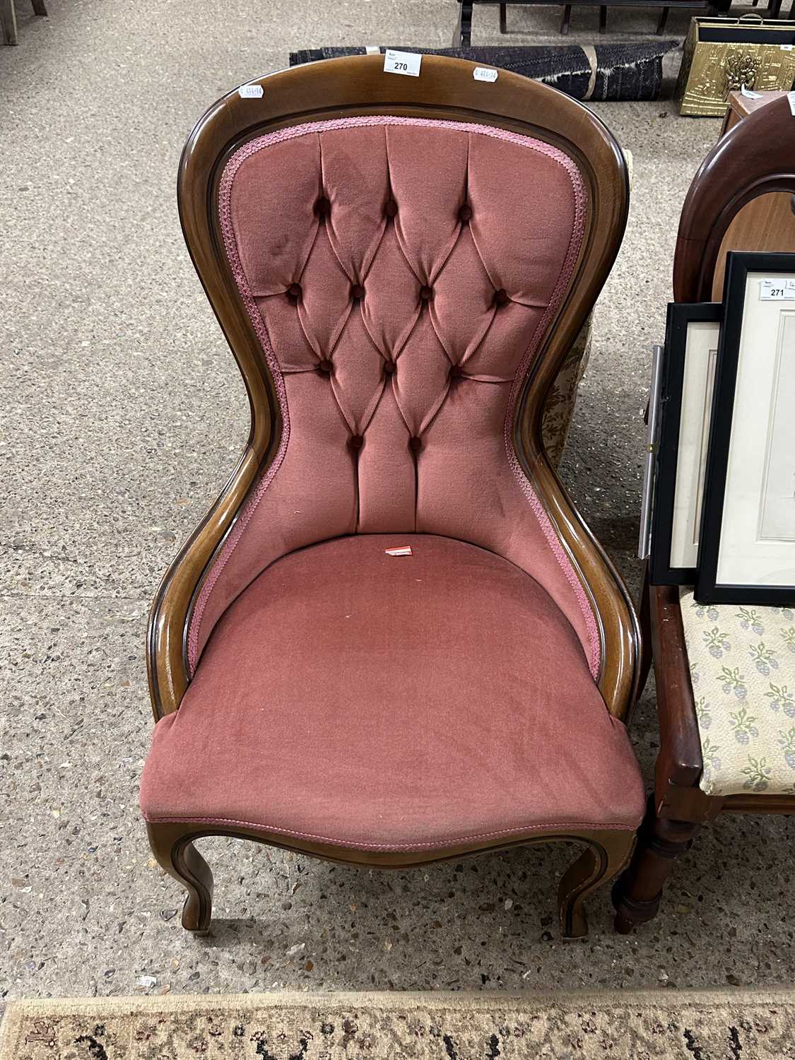 Pink upholstered button back chair