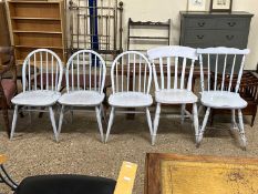 A group of five pale blue painted kitchen chairs