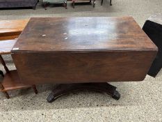 19th Century mahogany pedestal Pembroke table with platform base and carved scrolled legs