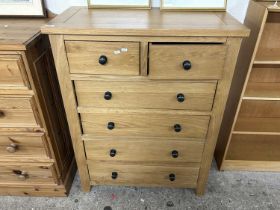 A modern oak six drawer bedroom chest