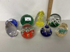 A collection of eight modern paperweights