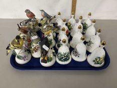 A group of modern porcelain hand bells comprising a set with bird finials and a Danbury Mint set A