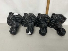 Set of four cast iron feet for a bath