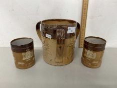 A Doulton Lambeth Tyg together with two similar stone ware mugs (3)
