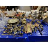 Large Mixed Lot: Various brass and copper wares to include candelabra, fire tools, serving trays,