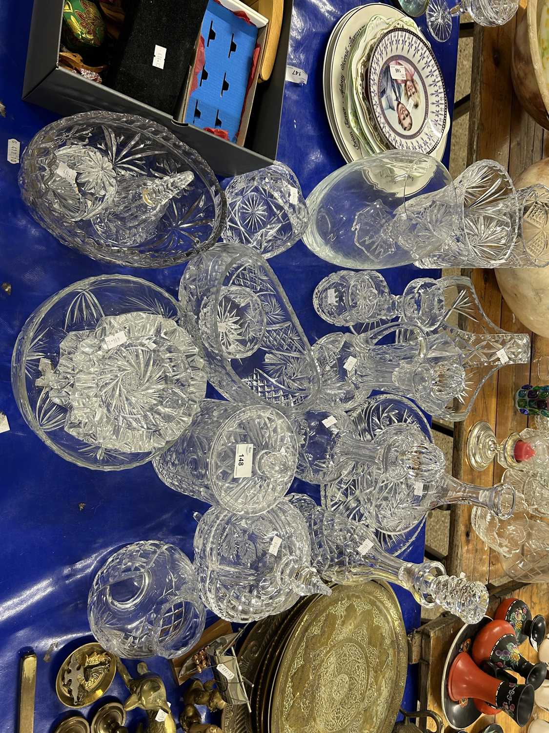 Large Mixed Lot: Various clear glass decanters, crystal glass bowls, table baskets and other iteems