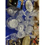 Large Mixed Lot: Various clear glass decanters, crystal glass bowls, table baskets and other iteems