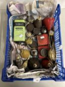Box of various small oil cans