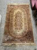Small beige patterned rug