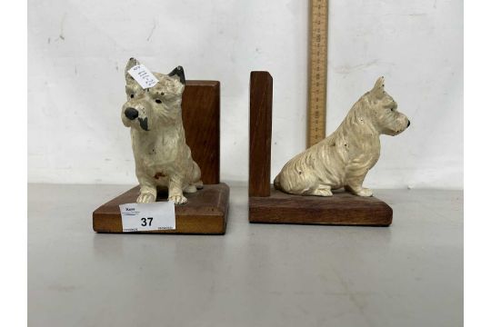 A pair of book ends mounted with Scottie dog decoration