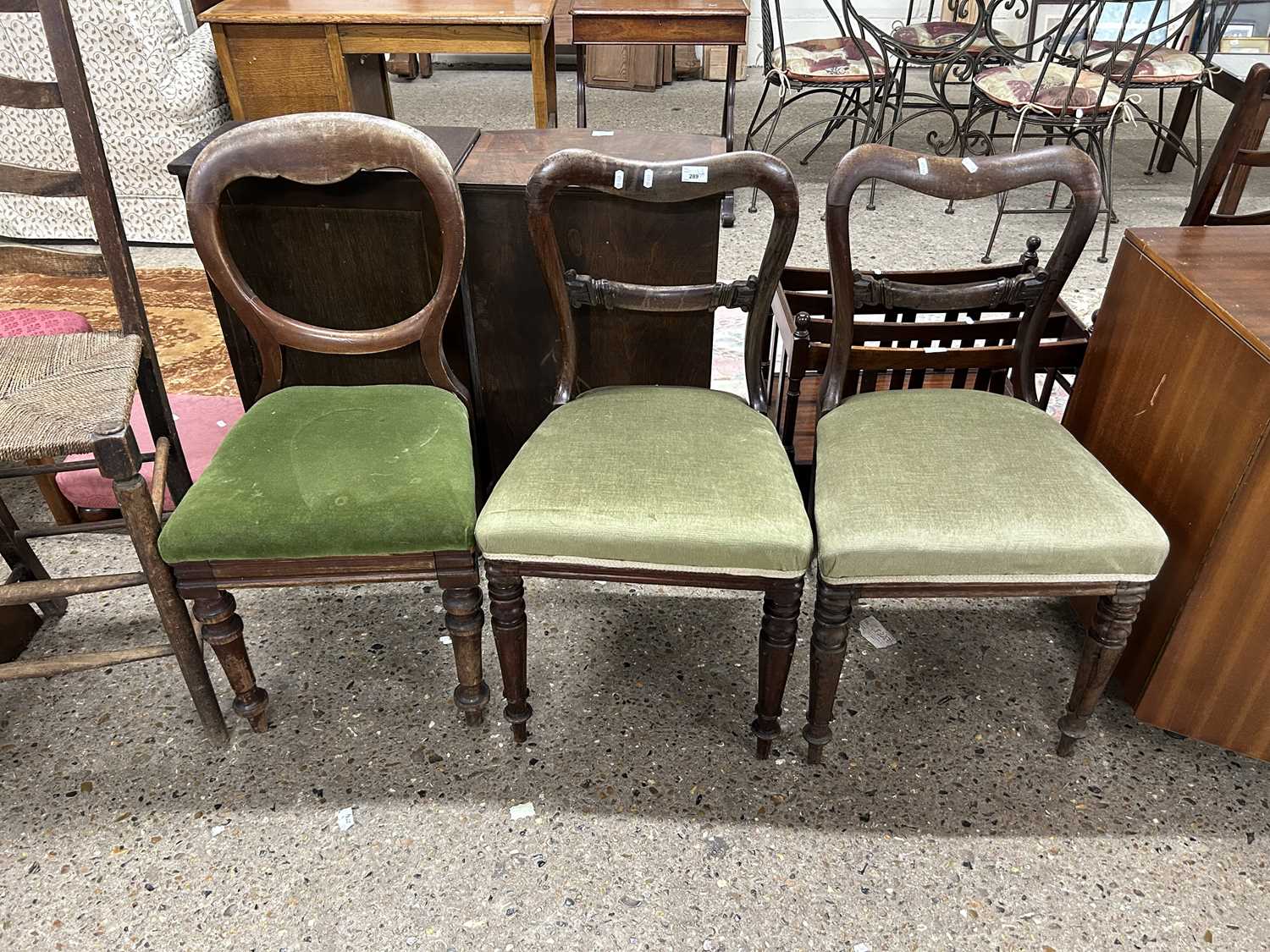 Three green upholstered Victorian dining chairs