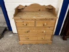 A pine galleried back four drawer chest