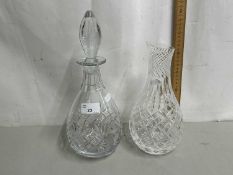 Modern crystal glass decanter and similar carafe (2)