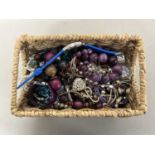 Basket of assorted costume jewellery