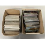 Two boxes of various assorted postcards