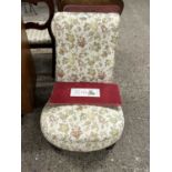 Late Victorian floral upholstered nursing chair